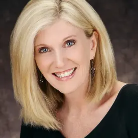 Portrait of Julie Mathews-Johnson, REALTOR®