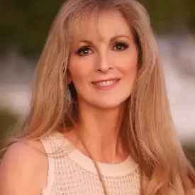 Portrait of Tricia Reaves Baily, REALTOR®