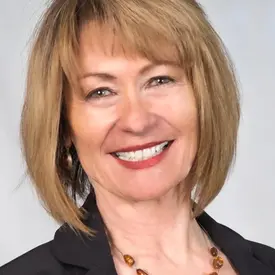 Portrait of Judy Glauser, Associate Broker